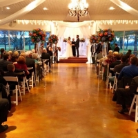 incredible glass stands and aisle markers in a january indoor wedding