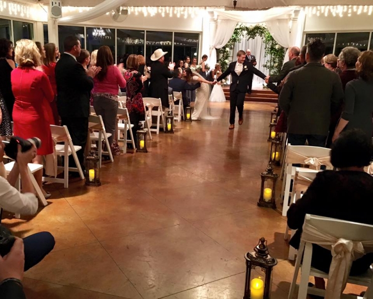 indoor wedding at night in Dec after saying I do