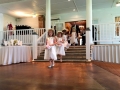 Adorable flower girl train at an indoor wedding at House Estate