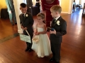 Flower girl and her sidekicks at a wedding at House Estate