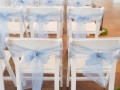 chair pics with blue sashes by Eric & Jenn Photography