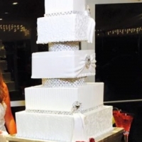 white squared five tiered cake