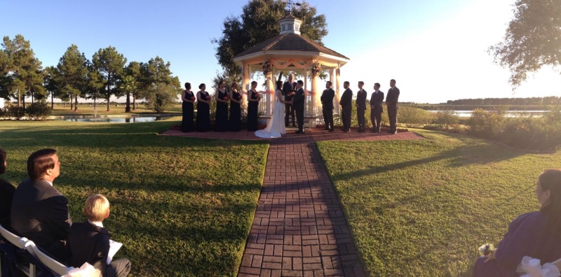 saying I do in an outdoor wedding ceremony