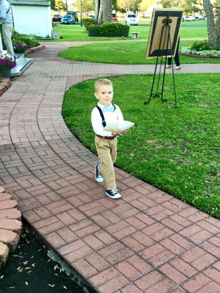 Adorable ring bearer at an outdoor wedding at House  Estate