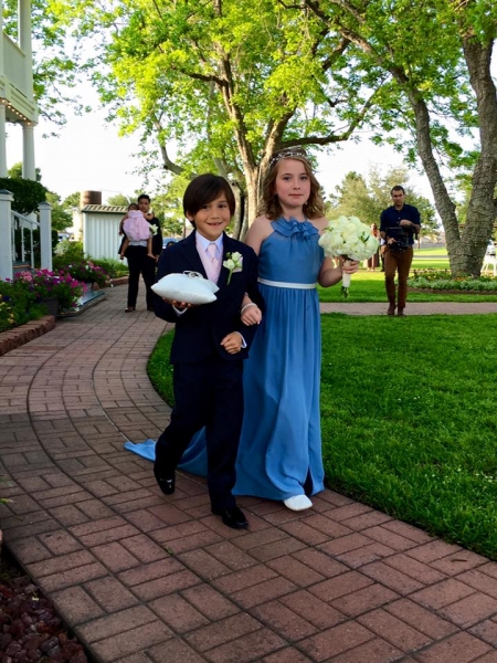 Flower girl in blue and a ring bearer at House  Estate