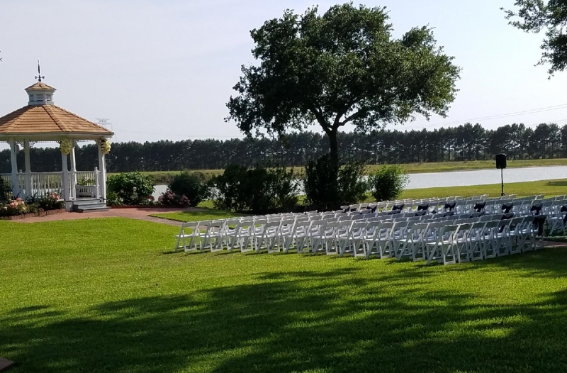 Katy outdoor wedding with lakeside views at House Estate
