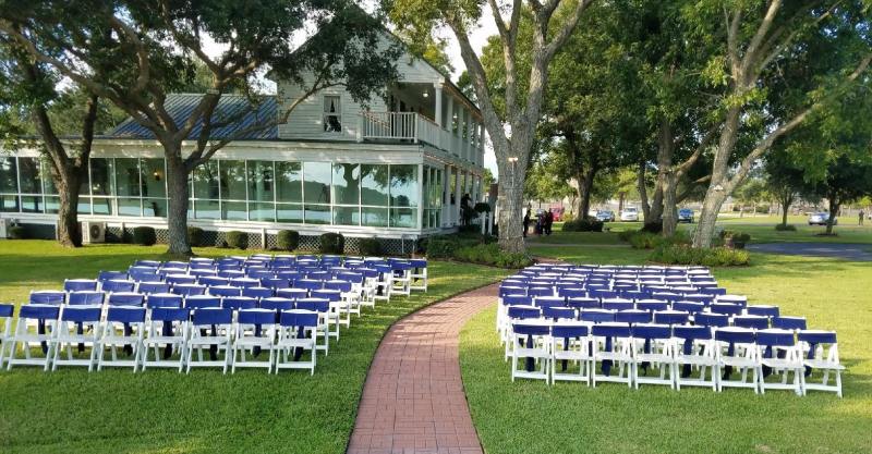 Outdoor-Houston-wedding-with-blue-chair-sashes
