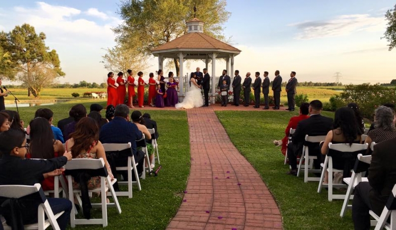 Red and black decor at an outdoor wedding at House  Estate