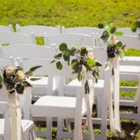 Outdoor-wedding-chairs-with-flowers-min