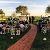 Outdoor wedding with beautiful flower aisle markers at House  Estate