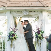 Wedding kiss at a September outdoor wedding