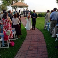 outdoor wedding and walking down the aisle in june