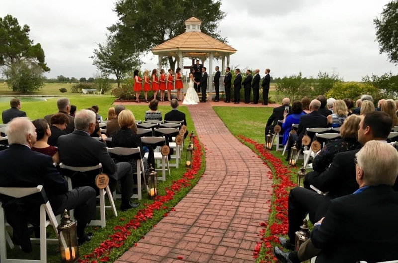 outdoor wedding at House Plantation with red rose petals
