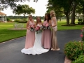 bridal party with beautiful grounds backdrop