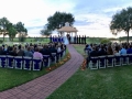outdoor wedding in november with aisle with multicolor rose petals