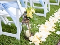 rose petals and flower aisle markers