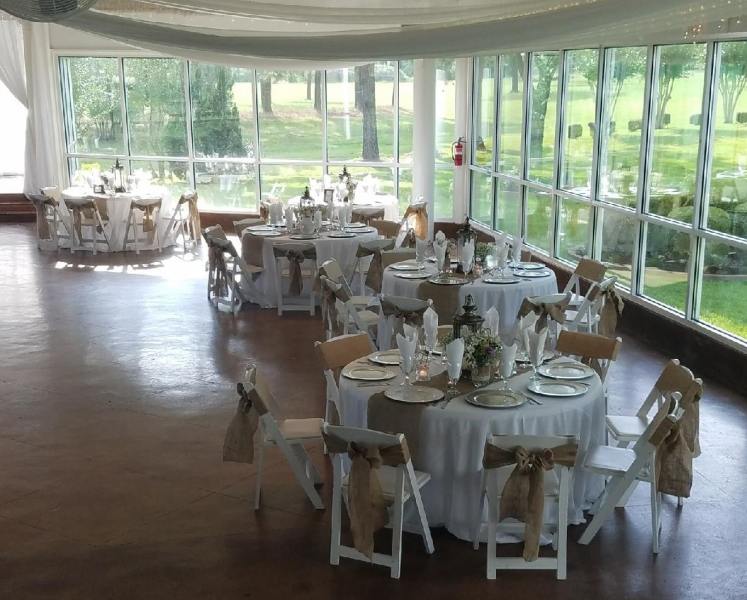 beautiful reception tables with burlap sashes at a houston wedding