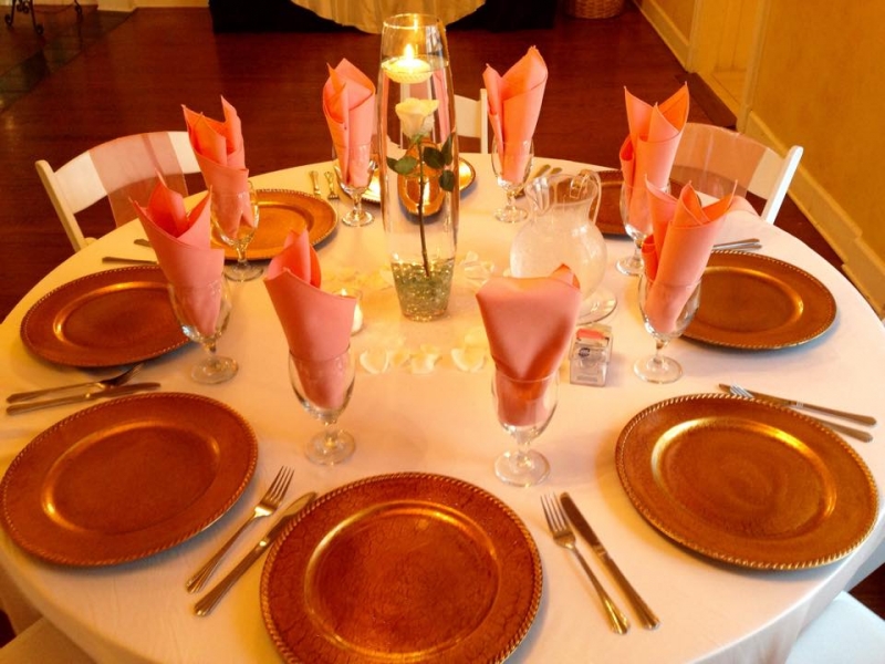 beautiful wedding reception table with a single rose and candle.jpg