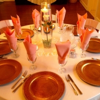beautiful wedding reception table with a single rose and candle.jpg
