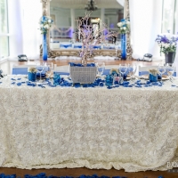 bride and groom table in bright blues