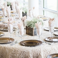elegant reception tables with baby breaths center pieces