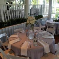 prepping-reception-tables-for-a-Houston-wedding-at-House-Estate