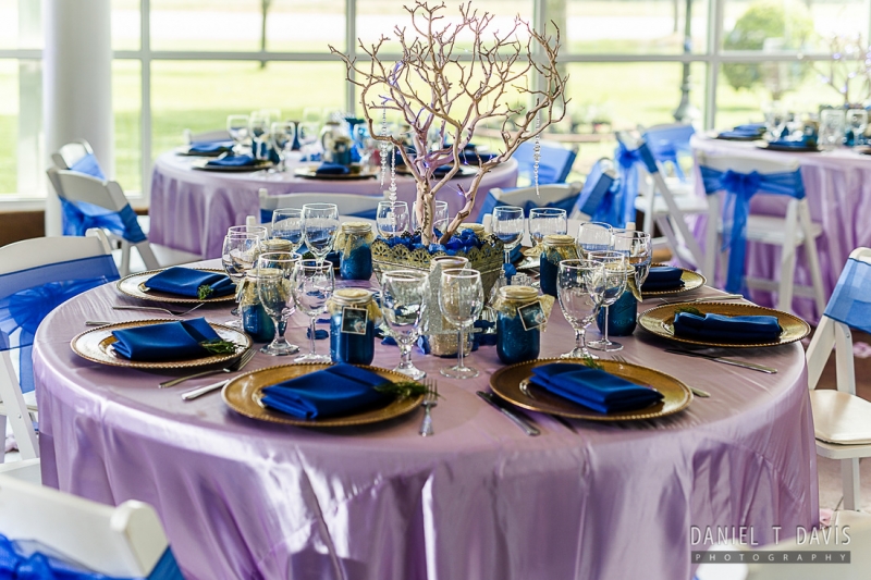 reception table set in bright blues in Houston