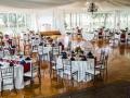 Indoor-Wedding-Reception-with-Blue-Satin-Napkins-min