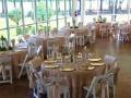 Lantern-and-flower-vase-centerpieces-at-a-House-Estate-reception