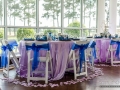 reception tables surrounded by rose petals