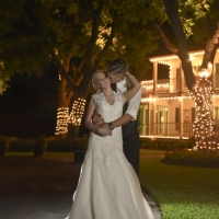 wedding kiss in front of House Estate