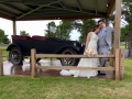 An antique car and a bride and groom at House Estate