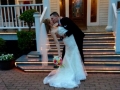 wedding kiss on the front steps in april.jpg