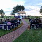 outdoor-wedding-in-november-with-aisle-with-multicolor-rose-petals