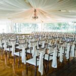Indoor-wedding-chairs-set-up-min