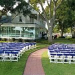 Outdoor-Houston-wedding-with-blue-chair-sashes